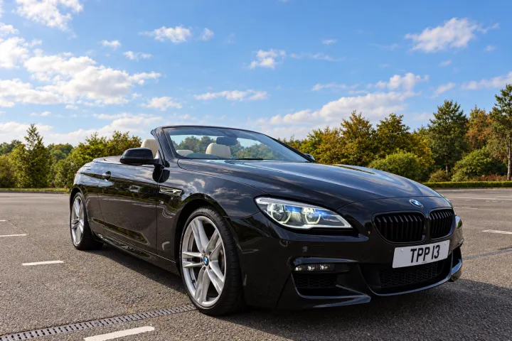 Low front three-quarter view, roof down