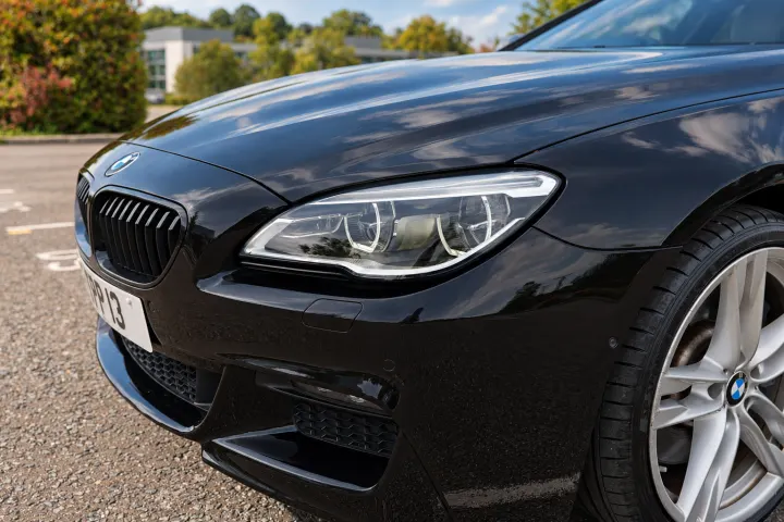 Passenger side headlight and front bumper detail
