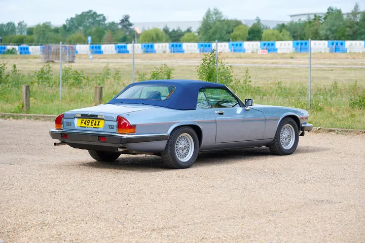 Rear three-quarter, hood raised